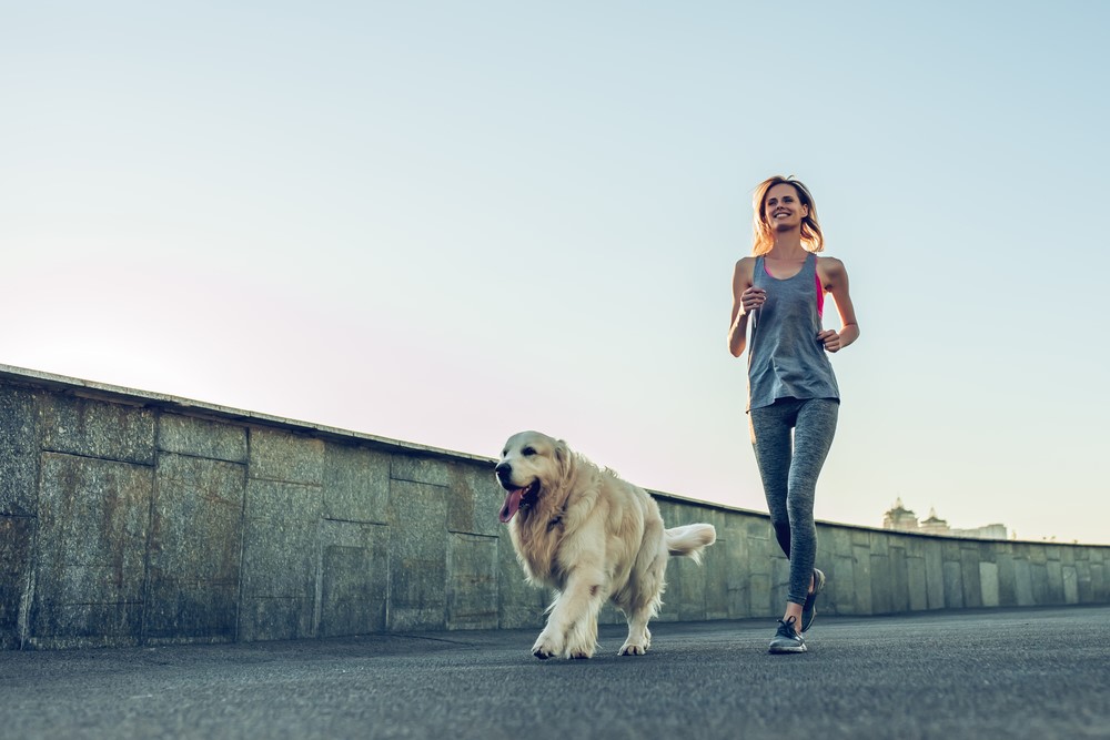 women jogging from breast augmentation recovery to full health
